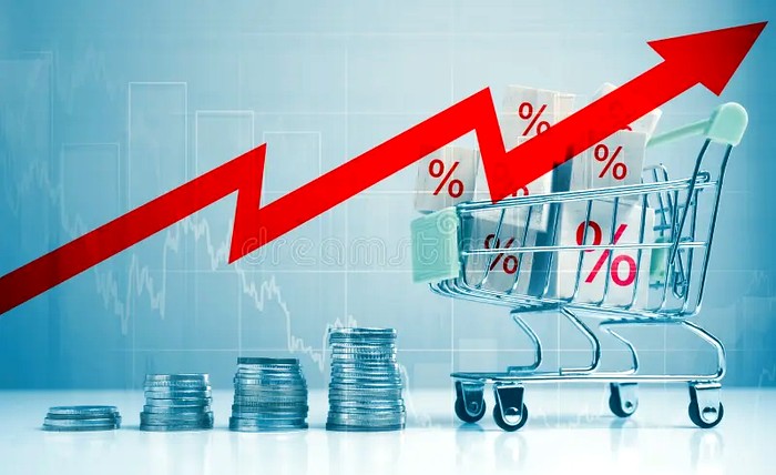 Rising sales graph with coins and shopping cart